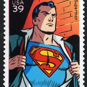 May include: A red, blue, and yellow Superman logo on a blue background. The logo is on a vintage-style postage stamp with the text "USA 39" and "Superman" printed on it.