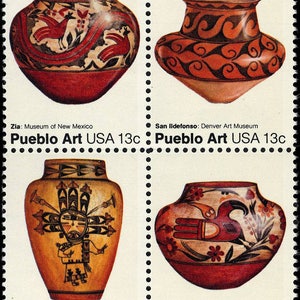 May include: Four different Pueblo pottery pieces, each with unique designs and colors. The top left piece is red with black and white designs, the top right piece is orange with black designs, the bottom left piece is yellow with black and red designs, and the bottom right piece is red with black and white designs. The text on the stamps reads "Pueblo Art USA 13c".