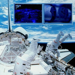 Two 2 Escaping the Gravity of Earth stamps (two-stamp sheet) // 3.20 cent stamps // Face value 6.40