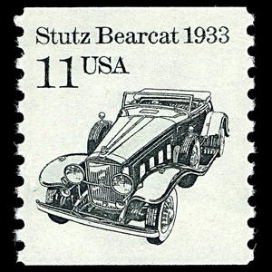 May include: A black and white illustration of a 1933 Stutz Bearcat car on a vintage US postage stamp. The stamp reads "Stutz Bearcat 1933" and "11 USA".