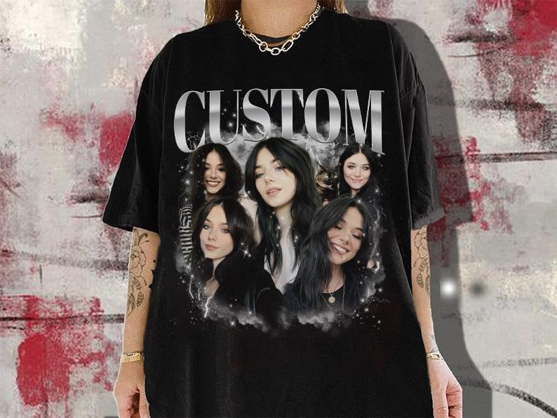 May include: Black t-shirt with a graphic print of five women with the word "CUSTOM" in large silver letters.