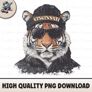 May include: A black and orange tiger wearing a black beanie with the word "CINCINNATI" in yellow letters and sunglasses. The tiger is wearing a black hoodie with a distressed look.