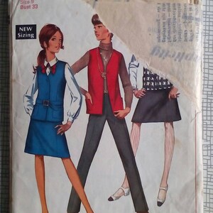 May include: A vintage sewing pattern for a junior petite size 9, bust 33. The pattern features three different outfits, including a blue skirt and vest, a red vest with a black turtleneck, and a black and white checkered skirt. The pattern is labeled "7875" and "New Sizing".