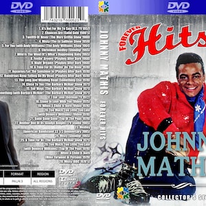 May include: DVD case for "Johnny Mathis Forever Hits: Collector's Set." The cover features a photo of Johnny Mathis in a red sweater and a black suit. The title is in red script. The back lists song titles.