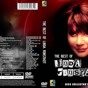 Könnte beinhalten: DVD-Hülle für "The Best of Linda Ronstadt" mit einem Porträt der Sängerin. Der Titel ist in einer fetten, stilisierten Schriftart gehalten. Das Disc-Sammler-Set enthält eine Liste der Songs und Aufführungsdaten. Die Hülle hat ein rotes und schwarzes Farbschema.