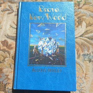 Un mundo feliz de Aldous Huxley / Novela de ficción distópica de tapa dura - Edición de la Biblioteca de Grandes Escritores, 1988