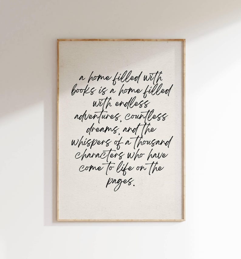 May include: A beige canvas print with a black handwritten quote that reads: "A home filled with books is a home filled with endless adventures, countless dreams, and the whispers of a thousand characters who have come to life on the pages."