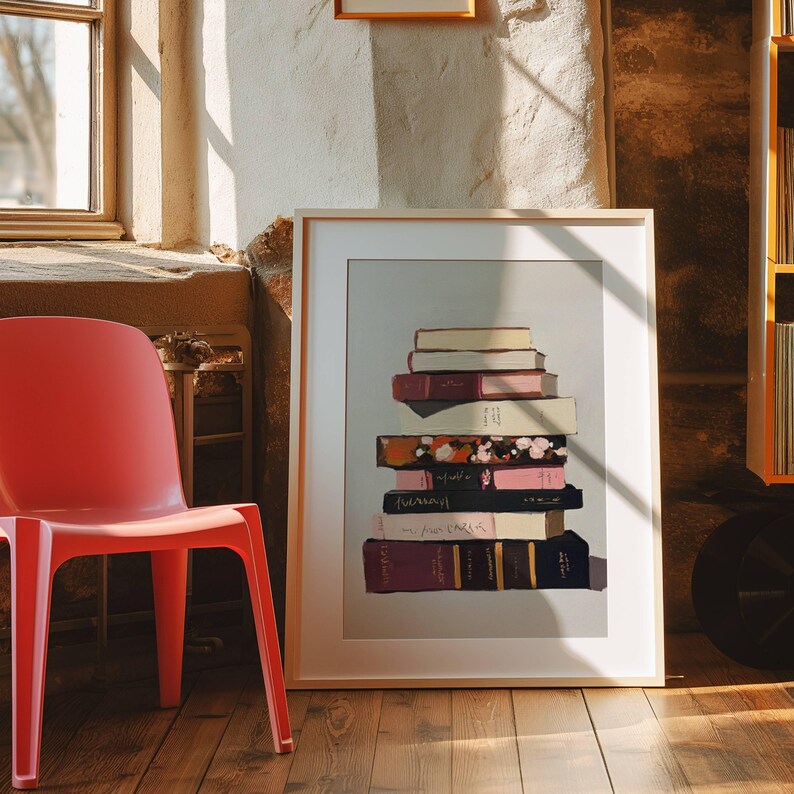 May include: A framed print of a stack of books with different coloured covers. The books are arranged in a stack, with the top book being the lightest colour and the bottom book being the darkest colour. The books are all different sizes and shapes.