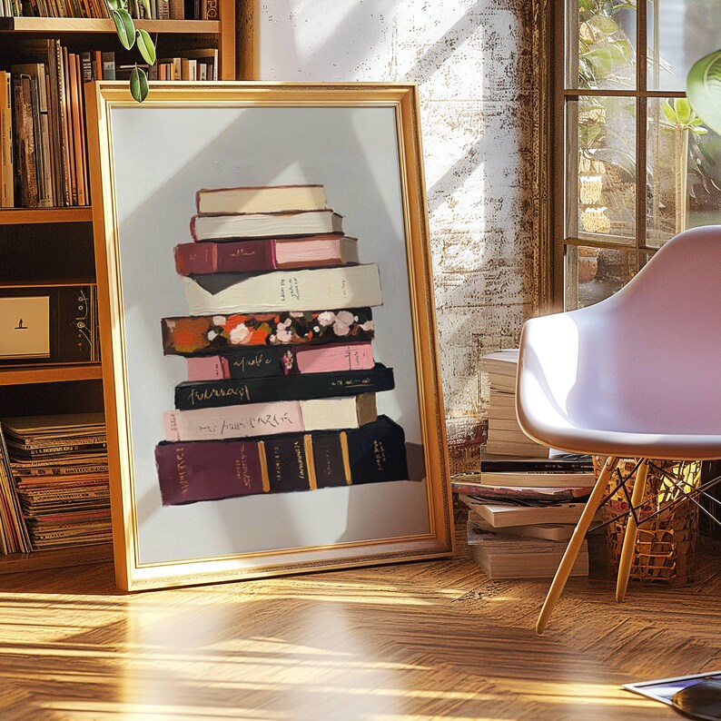 May include: A painting depicting a stack of books against a light blue background. The books are arranged in a pile, with the top book being a light brown colour. The other books are in a variety of colours, including pink, white, and black. The books are all different sizes and shapes. The painting is framed in a gold frame.