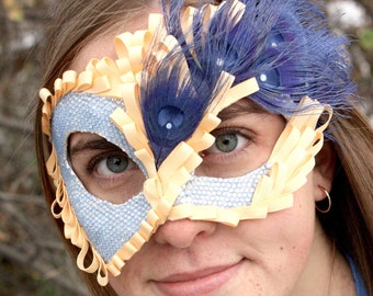 Opalescent - Masquerade Ball Mask in "Air Blue Opal" Swarovski Crystals, Blue Peacock Eye Feathers, and Apricot Ribbon