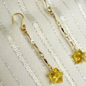 Twinkle Twinkle .... dangling yellow crystal star earrings ..  #512