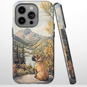 May include: A phone case featuring a watercolor painting of a pug dog sitting on a rock, overlooking a mountain landscape with a river. The case is light-colored with a black border.
