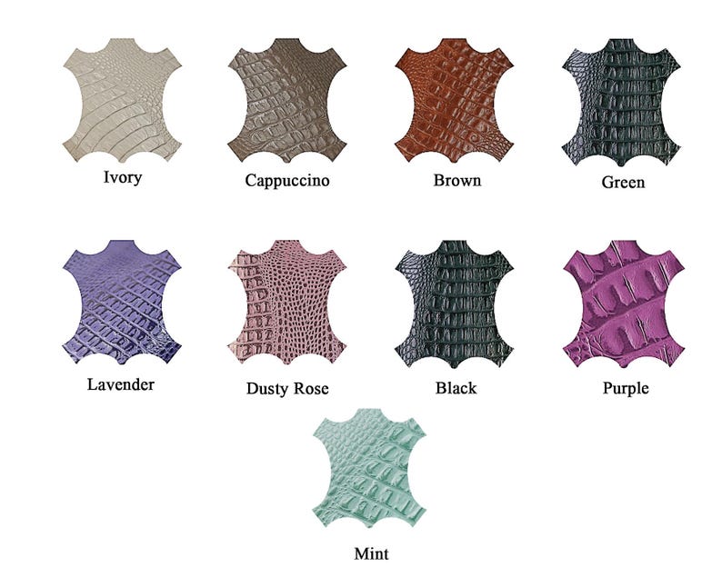 K&ouml;nnte beinhalten: Neun Lederst&uuml;cke mit Krokodilleder-Pr&auml;gung in einer Rasteranordnung. Die Farben umfassen Elfenbein, Cappuccino, Braun, Gr&uuml;n, Lavendel, Altrosa, Schwarz, Lila und Minze. Jedes Lederst&uuml;ck ist mit dem entsprechenden Farbnamen darunter beschriftet.