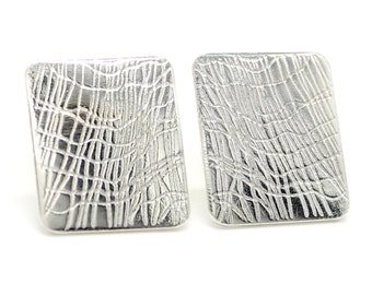 Second Skin textured Sterling Silver post earring