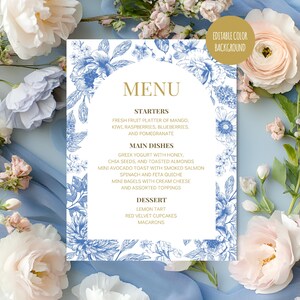 Può includere: Un modello di menu floreale blu e bianco con la parola "MENU" in lettere dorate. Il menu elenca antipasti, piatti principali e opzioni di dessert. Lo sfondo è modificabile.