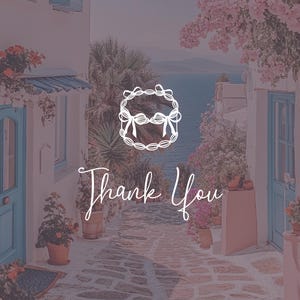 May include: A white wreath with a bow in the centre, with the text "Thank You" written in cursive below it. The wreath is set against a backdrop of a picturesque seaside town with white buildings and pink flowers.