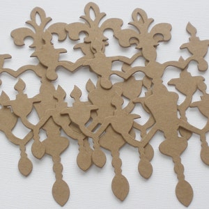 K&ouml;nnte beinhalten: Ein Set mit 10 braunen Papierschnitten eines Kronleuchters mit dekorativem Design. Die Ausschnitte sind perfekt zum Basteln und Scrapbooking.