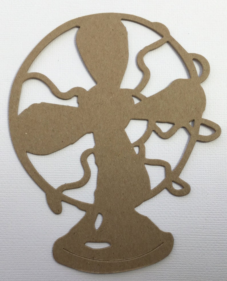 May include: A brown cardboard cutout of a vintage fan with a circular blade and a base.