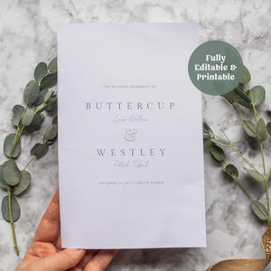 May include: A white wedding program with the names "Buttercup" and "Westley" in elegant script. The program includes the date "October 21, 1973" and the location "South Florin". A green circular sticker reads "Fully Editable & Printable".