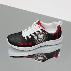 May include: White and black sneakers with a red and white graphic of a clown with the text "You'll float too!" on the side.