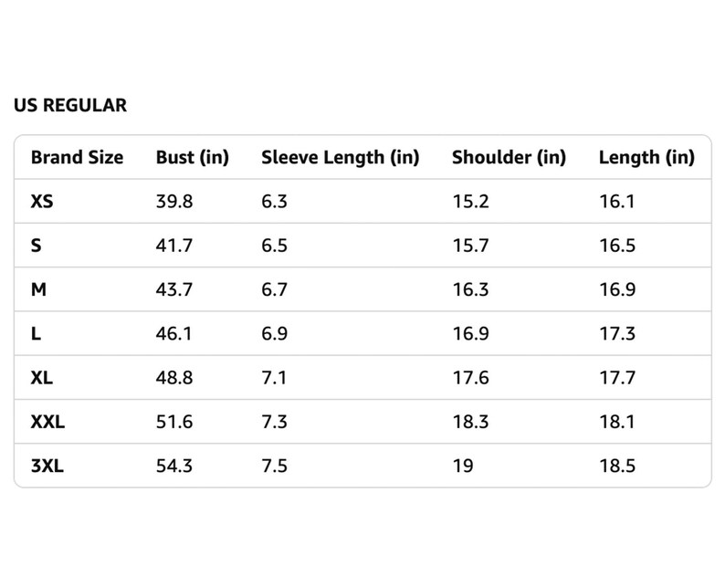 May include: A white chart displays US REGULAR sizing information. The chart includes brand sizes XS to 3XL, with measurements for bust, sleeve length, shoulder, and length in inches. The bust measurements range from 101.1 to 138 cm.