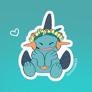 May include: A sticker featuring a cartoon character in shades of blue, orange, and black, wearing a flower crown. The character is smiling and has its hands clasped. A white heart is next to the character on a teal background. The artist's name is in the bottom right corner.