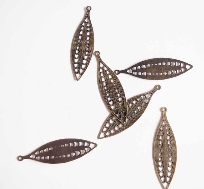 20 newly made die cut metal leaf nice long shape with rope cut out corn pattern 36x10.5mm bronze color image 1