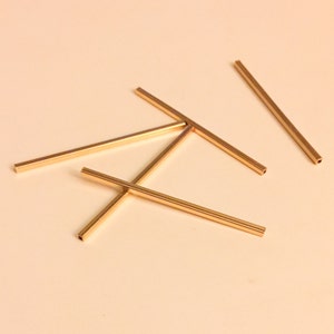 6 piece of thin square tube 2x2x54 mm with plating in gold color