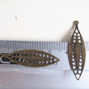 20 newly made die cut metal leaf nice long shape with rope cut out corn pattern 36x10.5mm bronze color image 3