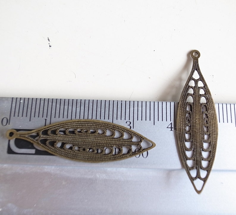 20 newly made die cut metal leaf nice long shape with rope cut out corn pattern 36x10.5mm bronze color image 3