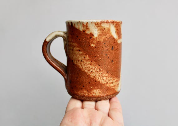 Classic Shino Glaze Stoneware Mug w/ an 11oz Capacity, Handcrafted Studio Pottery Mug, Organically Patchy Matte Grey & Orangey Rusty Glaze