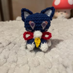 ScaraMeow de crochê de pelúcia