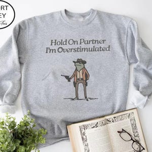 Hold On Partner Im Overstimulated Sweatshirt, Cowboy Frog Sweatshirt, Cowboy Frog Unhinged Shirt, Cute Animal Sweatshirt, Funny Frog Shirt image 7