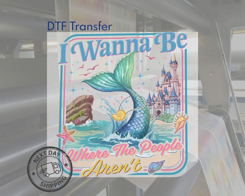 May include: DTF Transfer featuring a mermaid with a teal tail and a castle in the background. The text reads "I Wanna Be Where The People Aren't". The design includes seashells, a starfish, and birds. The image has a retro, cartoon style.