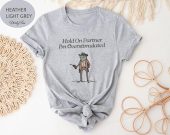 Hold On Partner Im Overstimulated Shirt, Cowboy Frog, Funny Meme Shirt, Funny Gifts for Friend, Funny Frog Tee, Gen Z Shirt, Cowboy Frog Tee