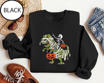 Skeleton Riding Dinosaur Sweatshirt, Mummy Dinosaur Sweatshirt, Halloween Dinosaur Shirt, Boys Halloween Gift, Spooky Season Sweatshirt