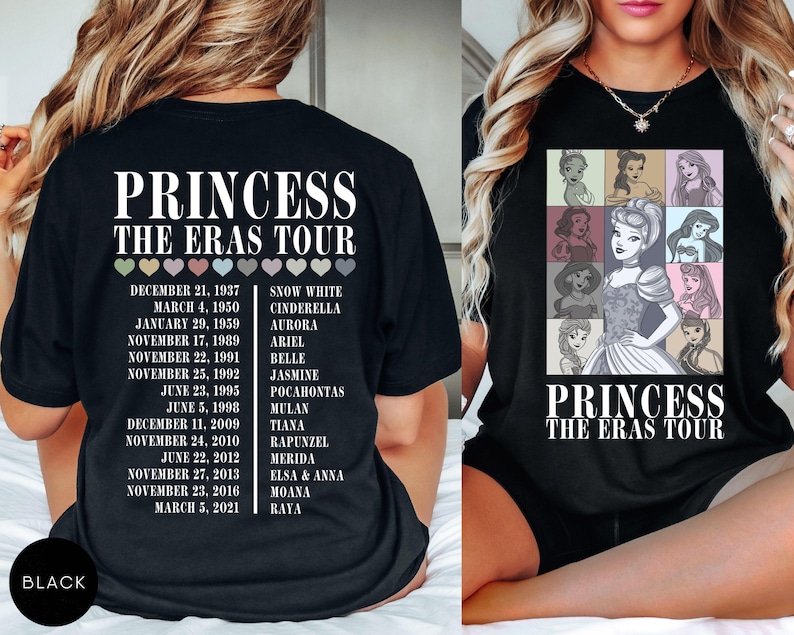 May include: Black t-shirt featuring the text "PRINCESS THE ERAS TOUR" with a list of dates and princess names. The front of the shirt displays a grid of princess illustrations. The shirt is a crew neck.