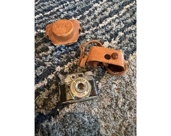 Minicámara espía Toko P.W. 4.5 Mighty de VTG + Estuche de cuero original. Excelente estado.