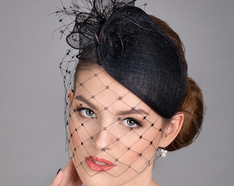 Black fascinator hat with face veil. Made to order hat.