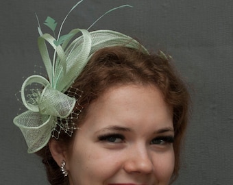 Light green fascinator.Green fascinator. Made to order.