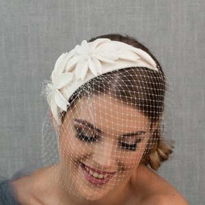 Bridal fascinator. Wedding fascinator with face veil. Made to order.