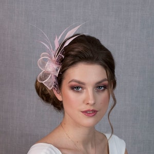 Pink feather fascinator. Pink wedding fascinator. Light pink fascinator.