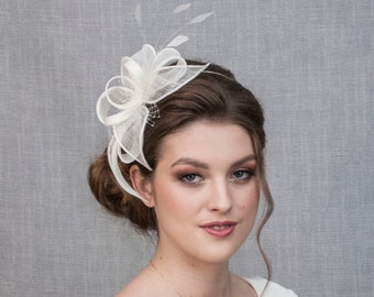 White wedding fascinator with feathers