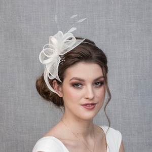 White wedding fascinator with feathers image 1