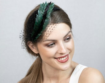 Black and green fascinator hat. New design A/W 2022-23.