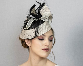 Black and cream white stunning fascinator hat. New design from 2023 hats collection.