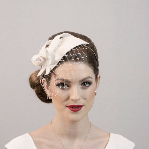 Light ivory white or cream white elegant fascinator hat for the weddings. Made to order.