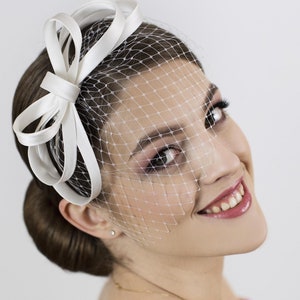 Bridal bow fascinator, wedding fascinator with veil, white wedding fascinator for the bride.
