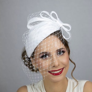 White wedding hat with face veil. Pure white bridal hat. Percer hat with face veil for the bride.