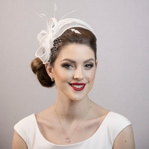 White wedding fascinator. White fascinator. Made to order, depending on what side of the head you want to wear it.